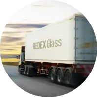 Redex Glass branded delivery truck on the road, representing fast and reliable global shipping.