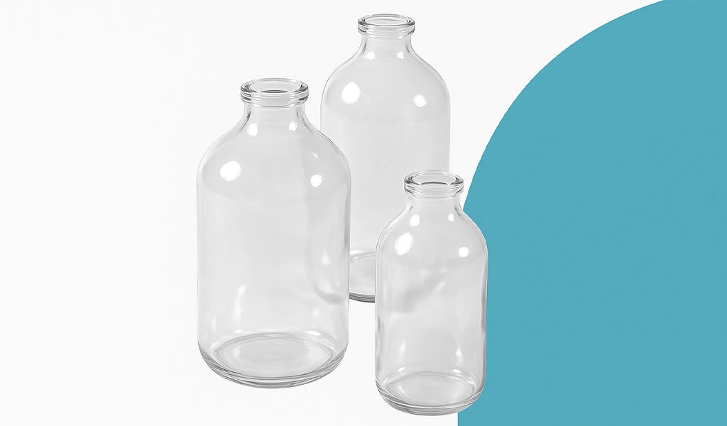 Three clear glass infusion bottles with uniform neck designs, displayed on a light blue and white background.