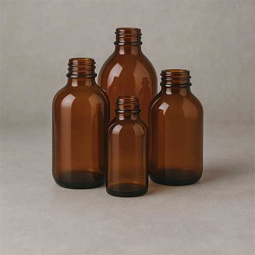 Redex Glass amber syrup bottles in assorted sizes, designed for pharmaceutical and medicinal use.